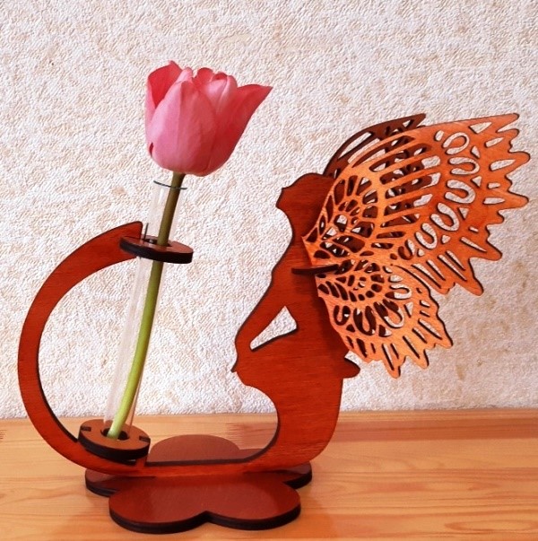 Wooden vase with fairy butterfly
