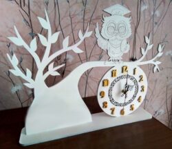 Owl on the tree clock