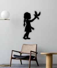 Little girl with bird wall decor